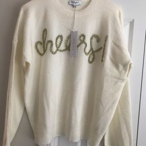 New with tags , size medium, cheers sweater